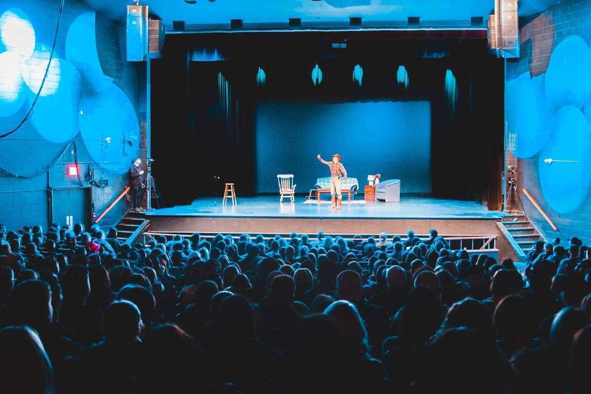 theater stage blue lights audience actor