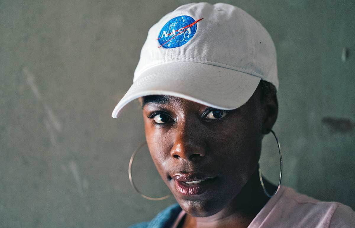 woman wearing baseball cap