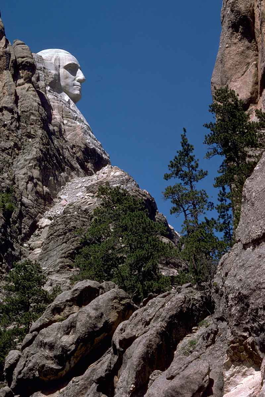The mountainside of Mount Rushmore, in the Black Hills of South Dakota, Source: Wikimedia Commons
