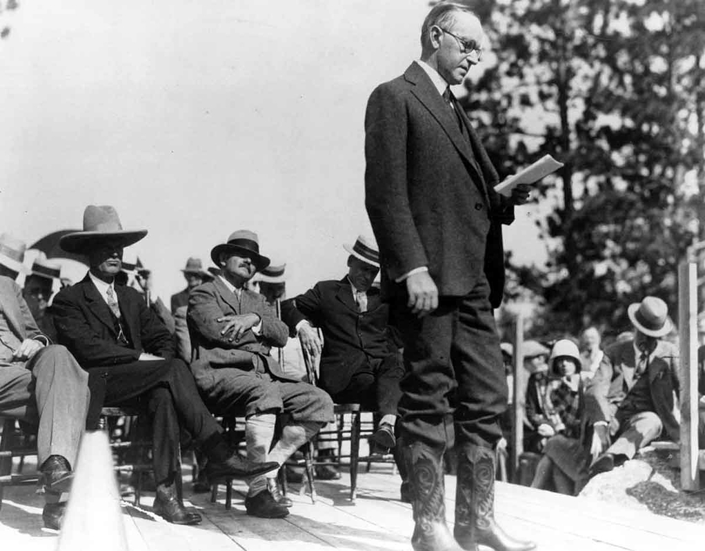 President Calvin Coolidge speaking at the first ceremonial drilling at Mount Rushmore, 1927. Source: Wikimedia Commons