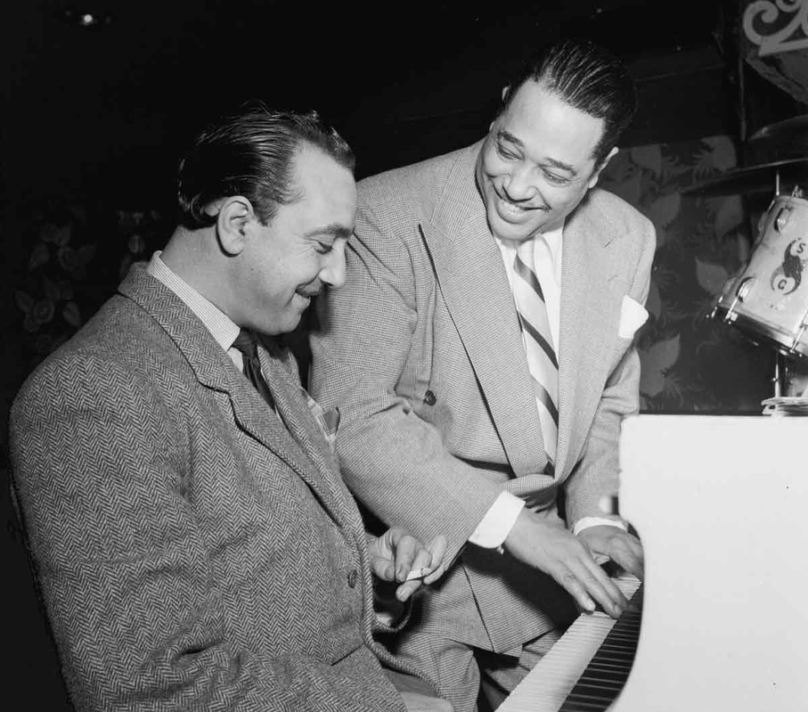 Django Reinhardt (left) with the great American pianist, composer, and bandleader, Duke Ellington (right), at the Aquarium, New York City, 1946, Source: Wikimedia Commons