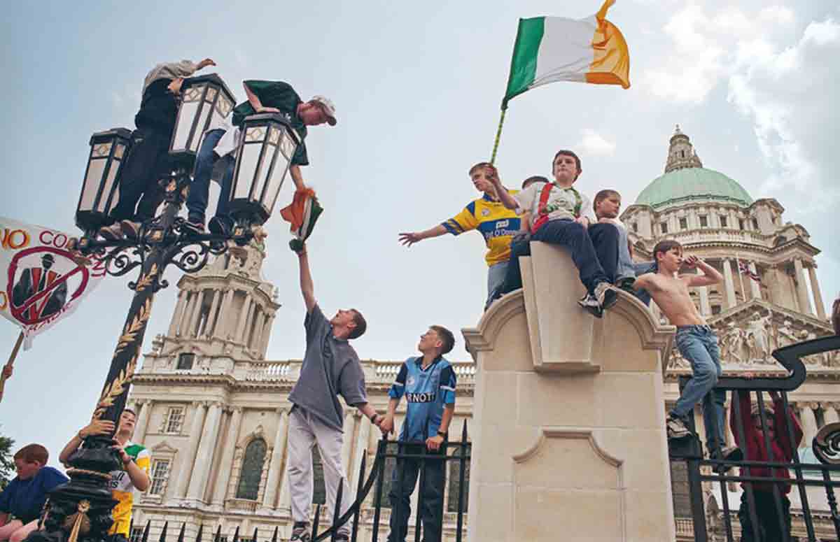 kids waving irish flag
