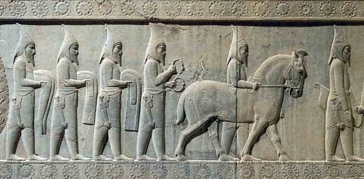 limestone relief saka delegation