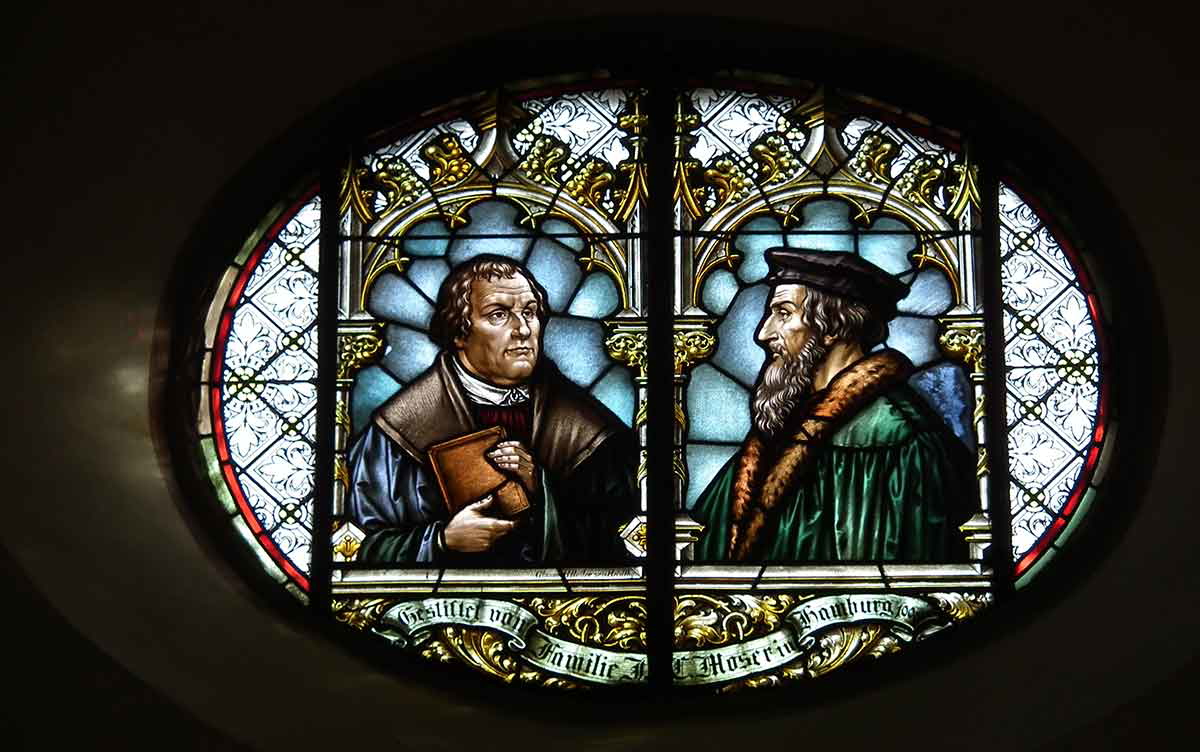 luther and calvin stained glass