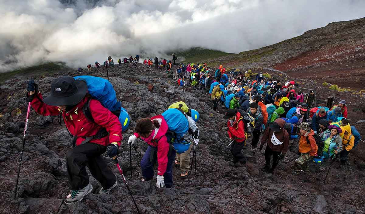 Climbers ascending Mount Fuji
