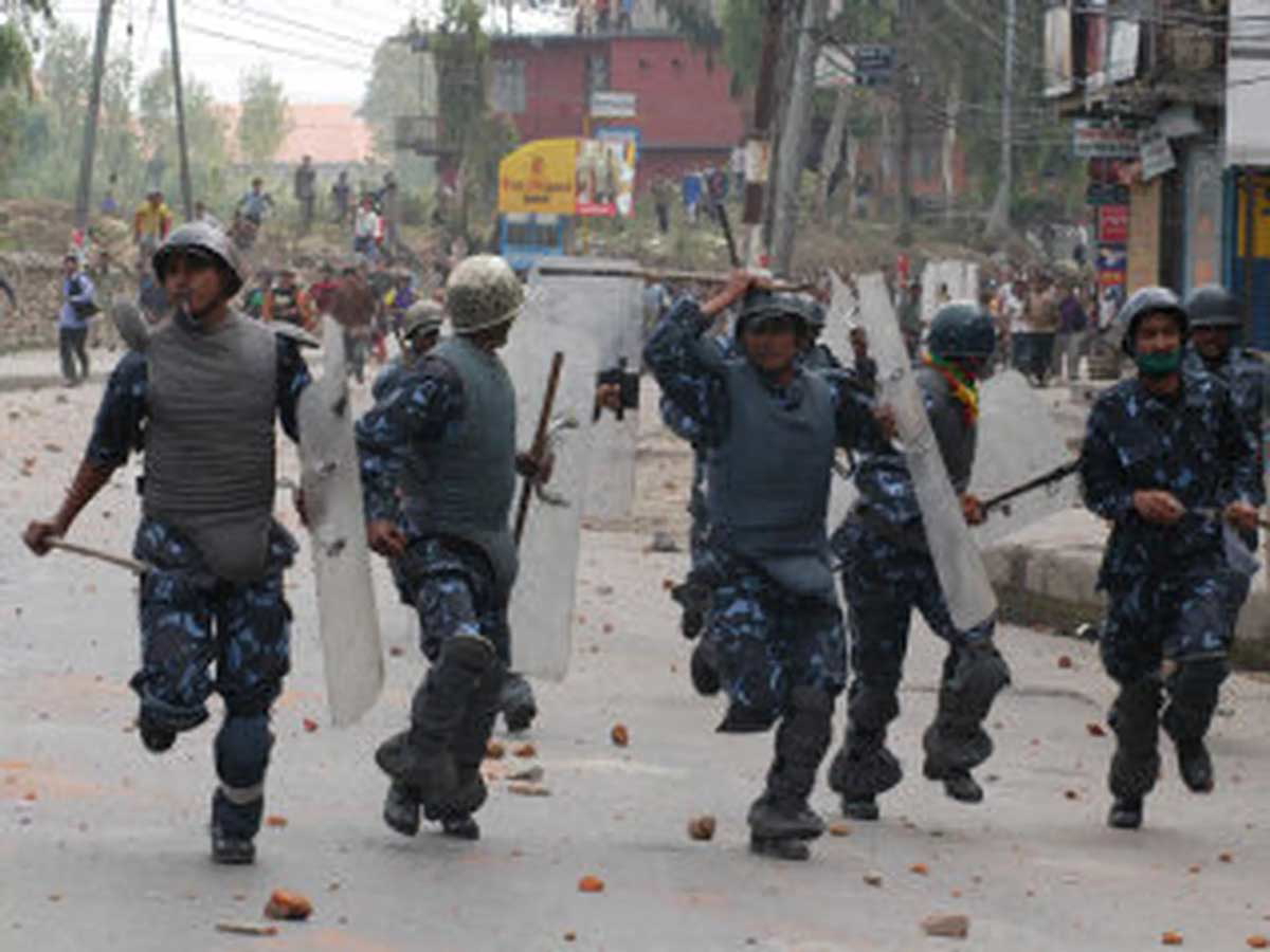 police flee protestors nepal