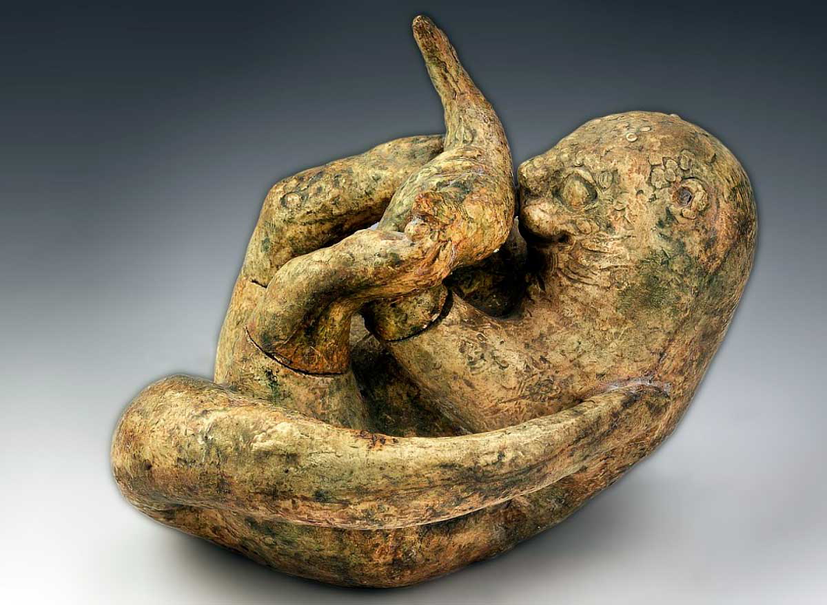 happy hungry otter sculpture