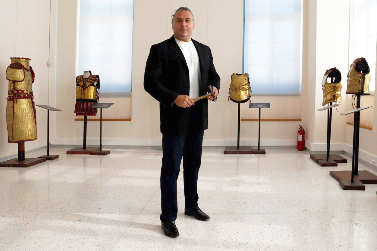 Dimitrios in a room exhibiting various armors from his collection, from Mycenean to Classical armors, in the local museum of Spata. Source: A. Chaliakopoulos / TheCollector