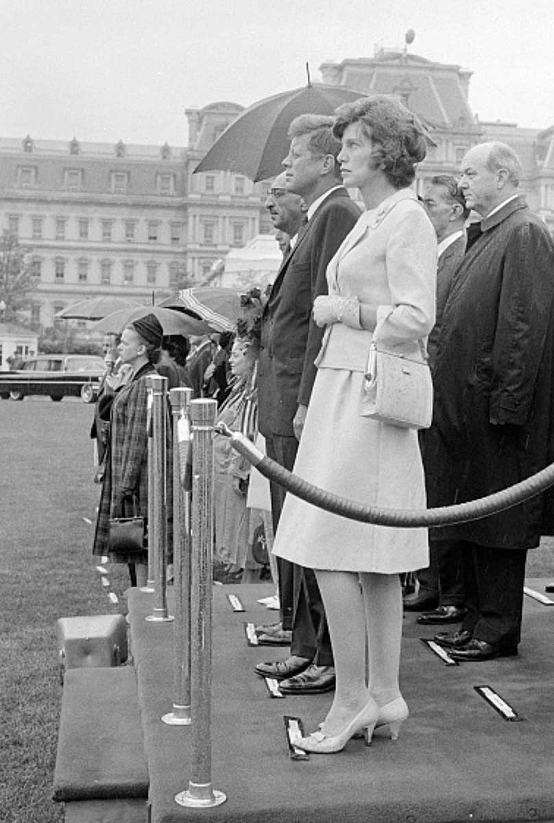 kennedy stands with sister