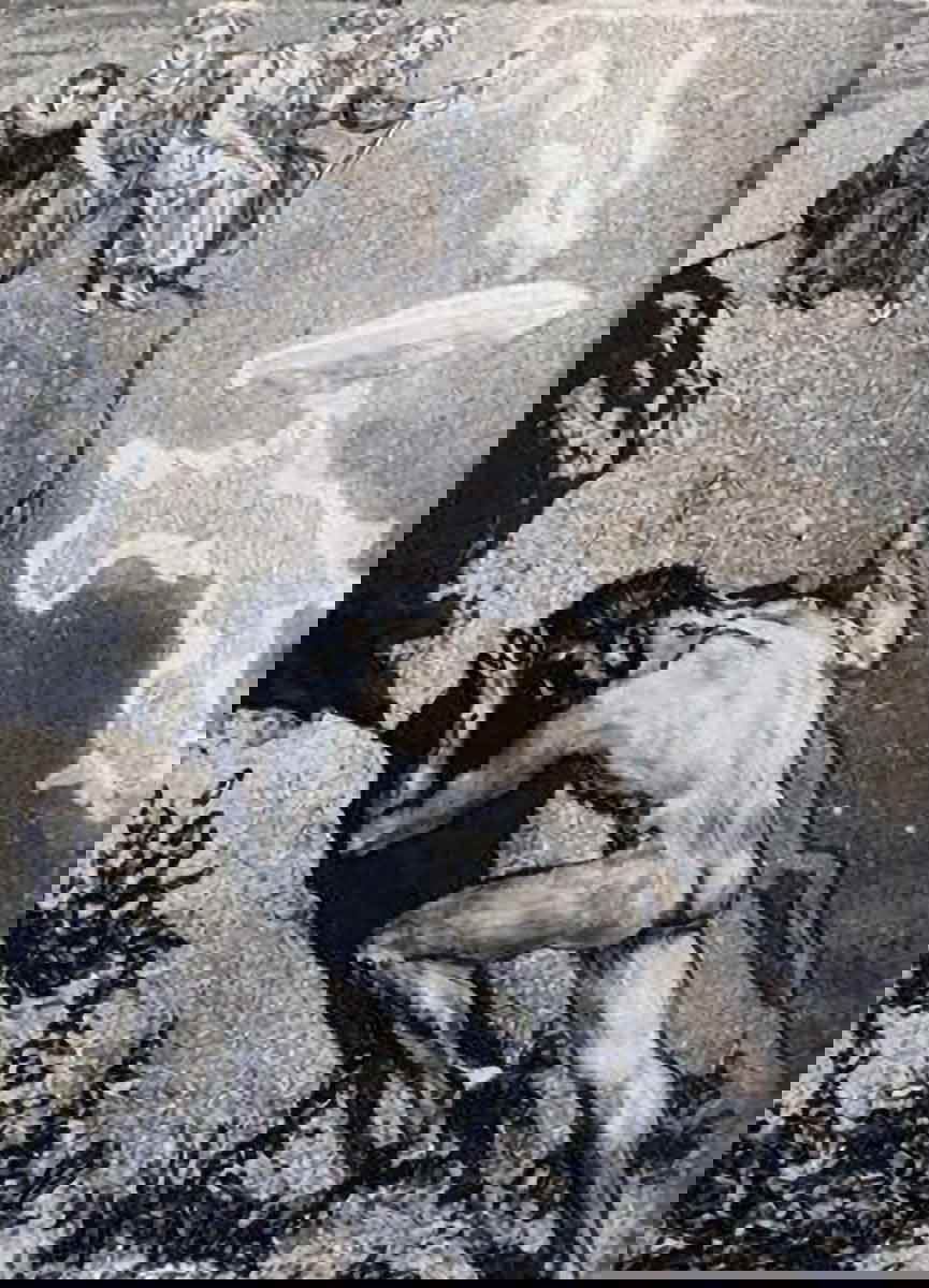 sisyphus pushing his rock uphill
