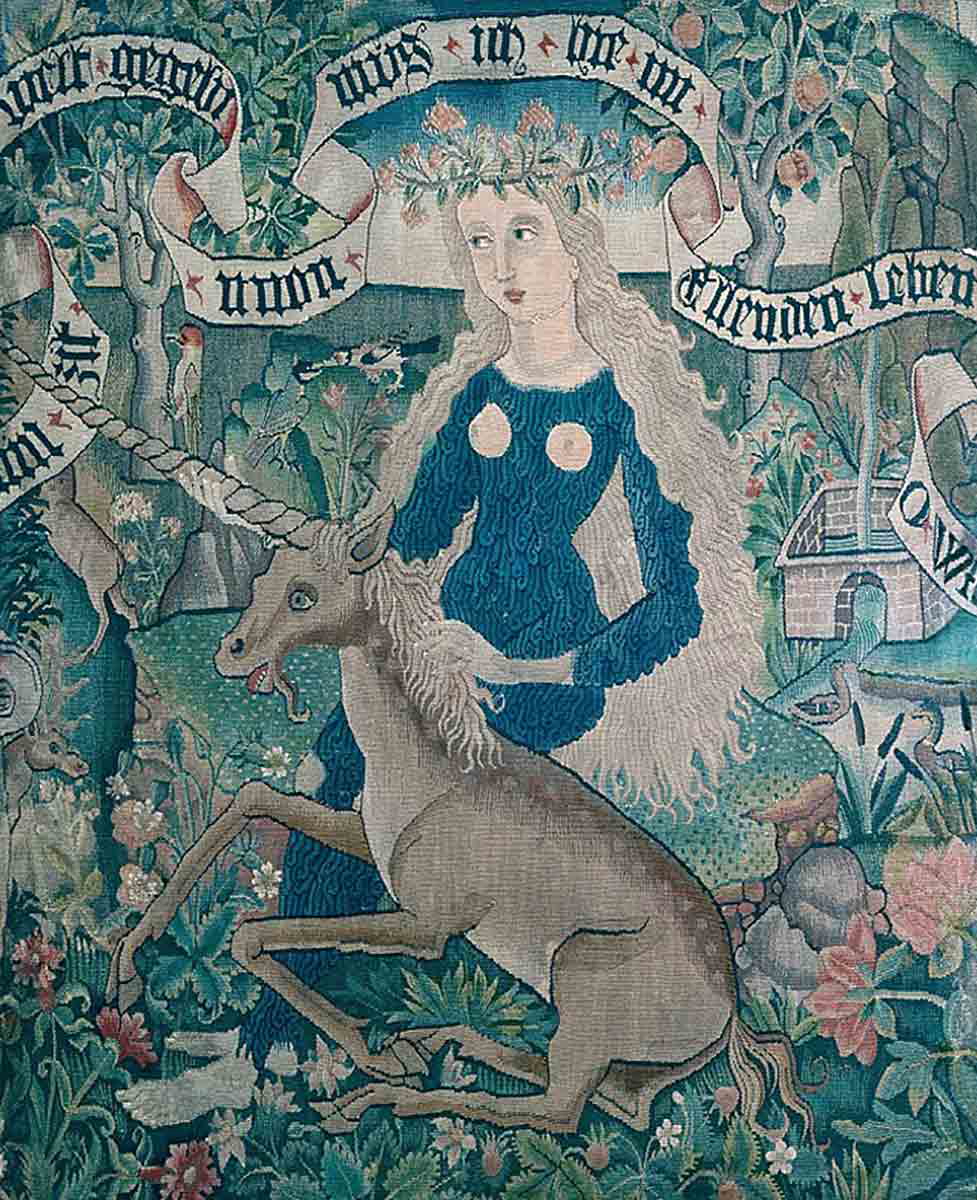 wild woman with unicorn bible