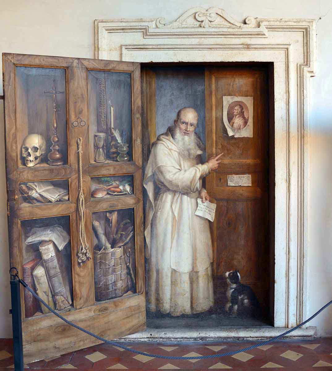benedictine monk and cat