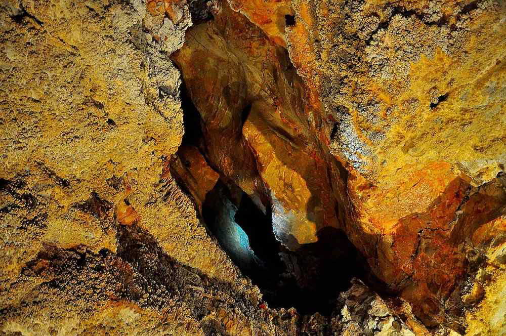 Colorful rock formations inside the Grand Canyon Caverns