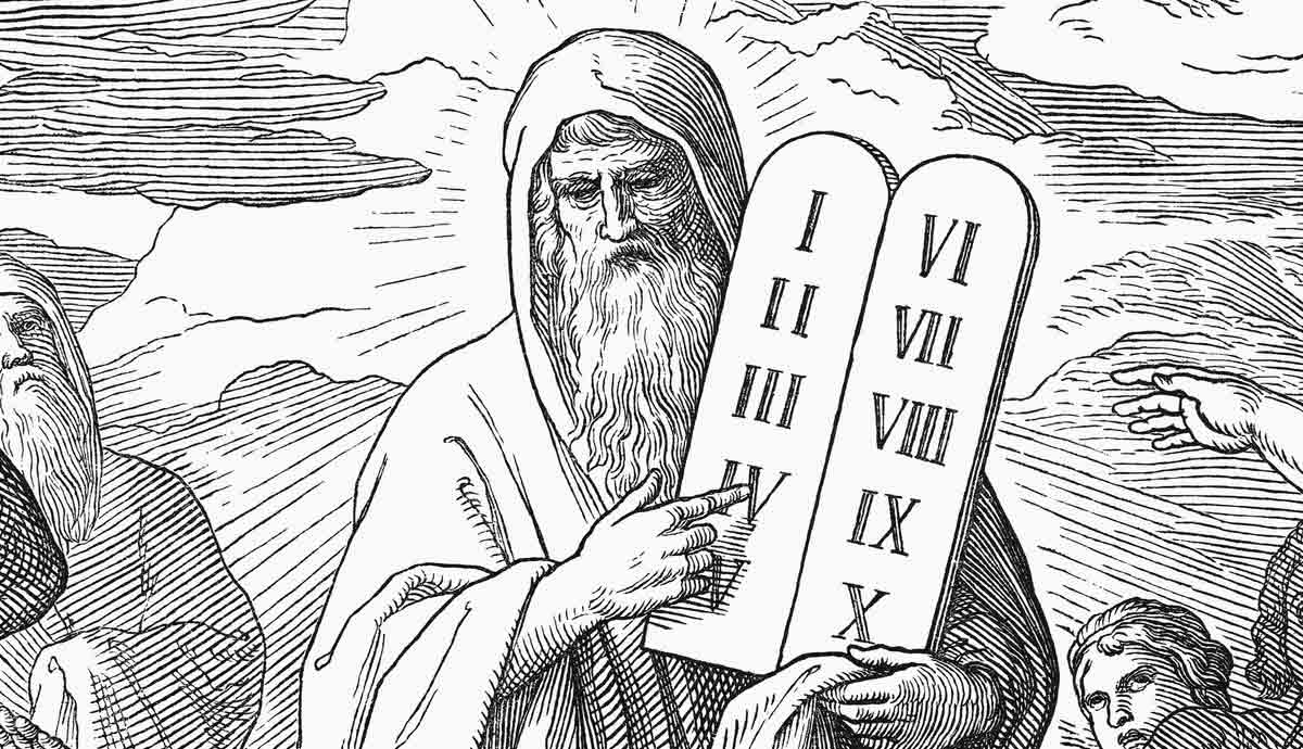 Moses holding the two stone tablets