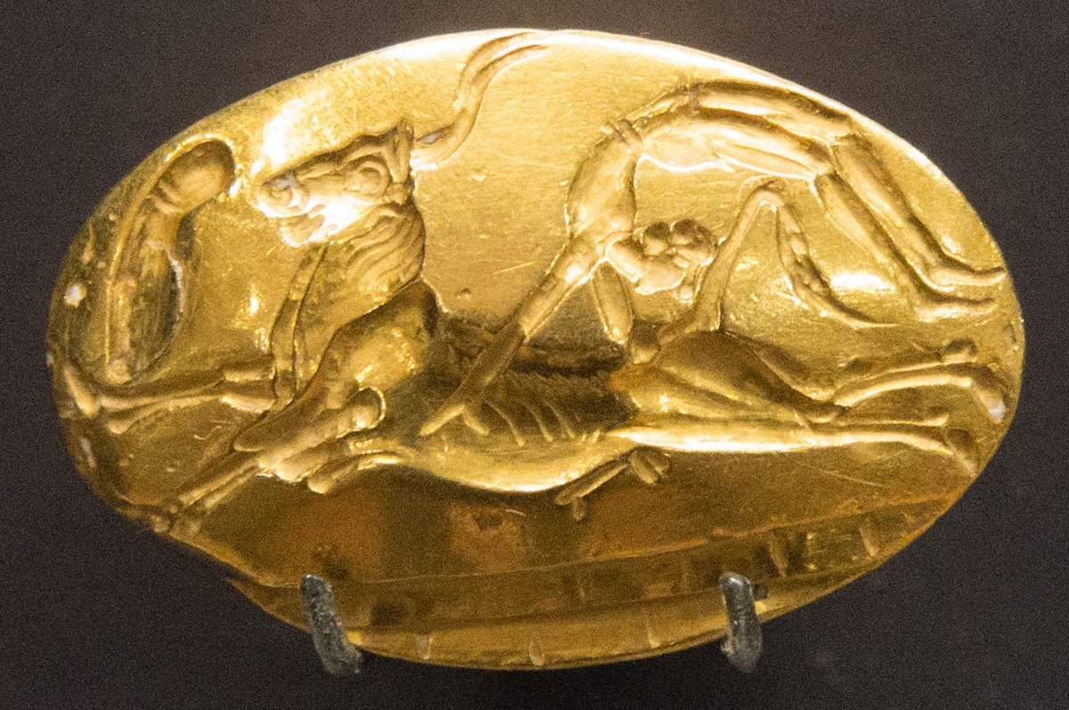 Minoan signet ring representing bull-leaping, Archanes, Crete, c. 1450-1375 BCE. Source: Ashmolean Museum