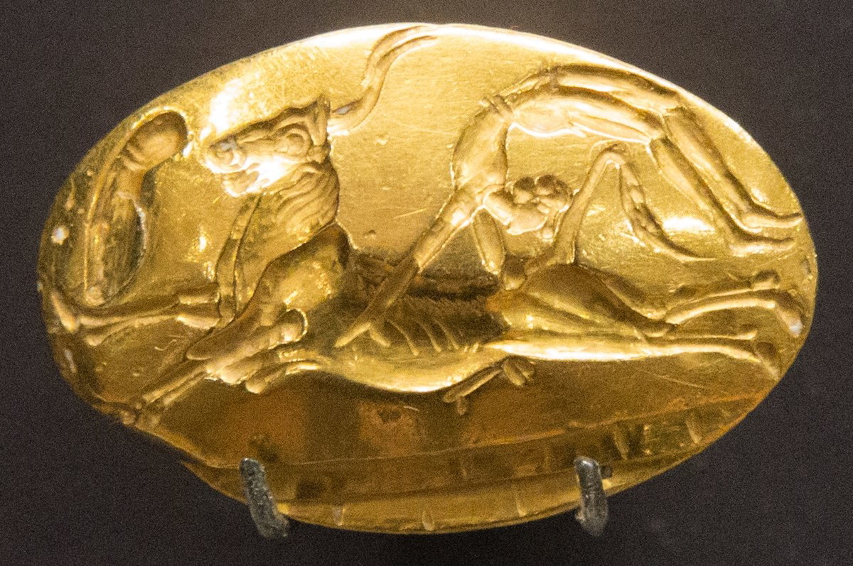 Minoan signet ring representing bull-leaping, Archanes, Crete, c. 1450-1375 BCE. Source: Ashmolean Museum