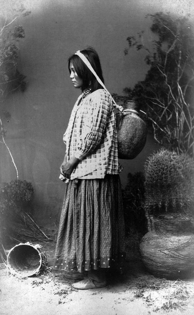apache woman with water