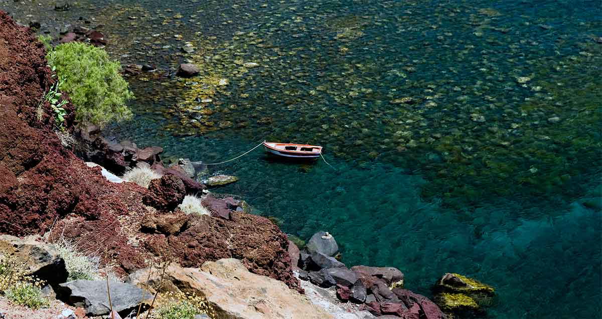 boat in water in santorini