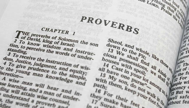Open Bible showing the Book of Proverbs