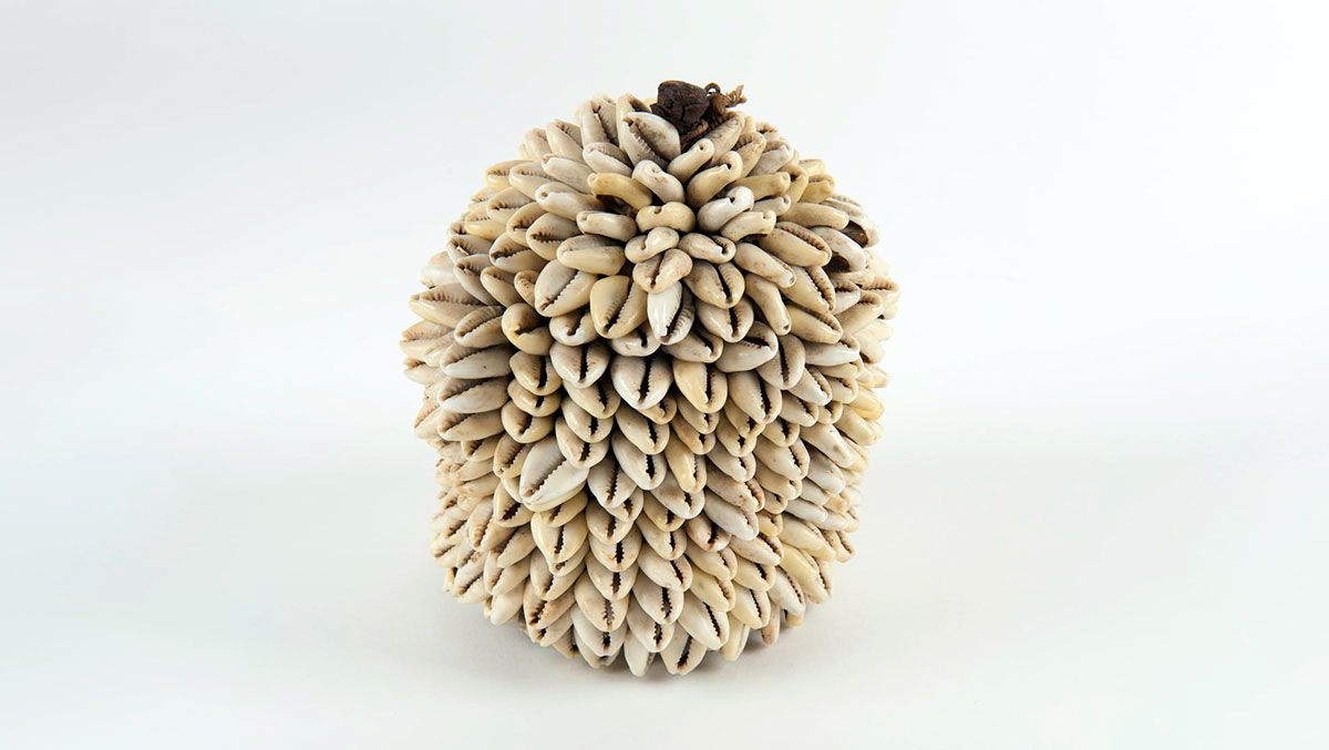 leather container cowrie shells
