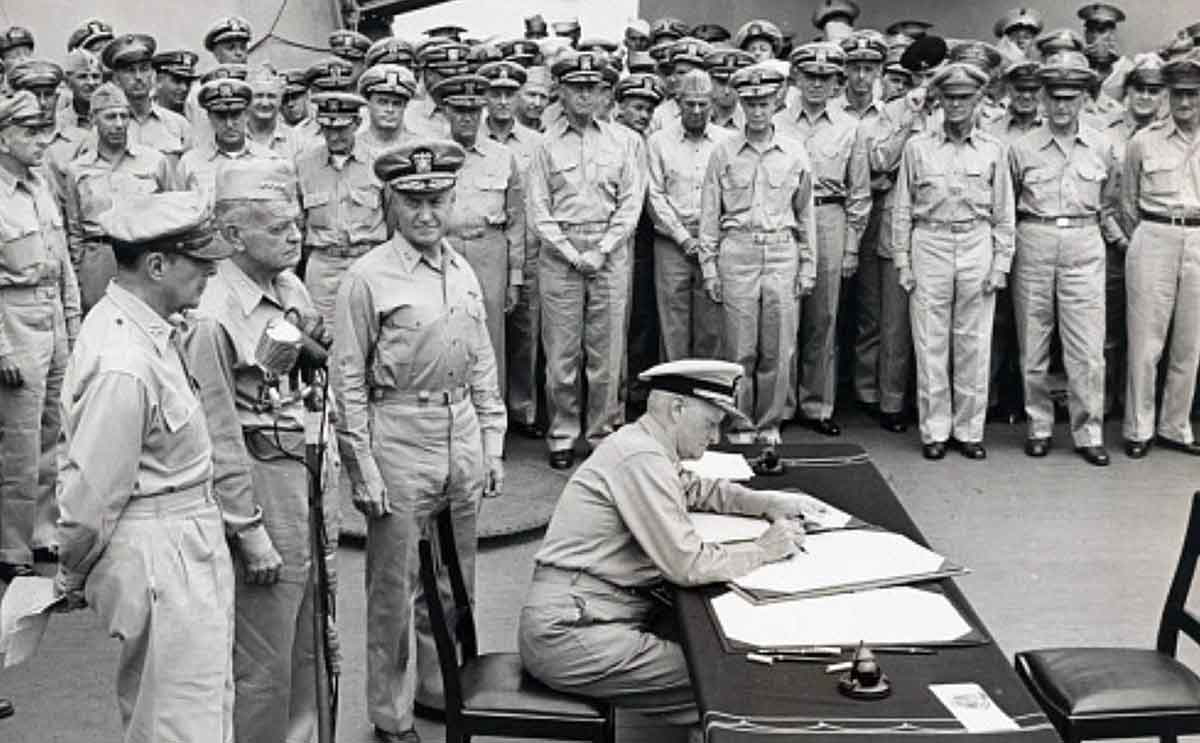 macarthur stands behind nimitz japanese surrender