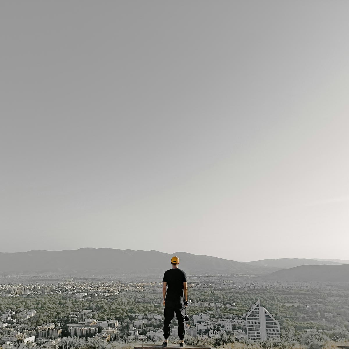 man looks at shiraz city