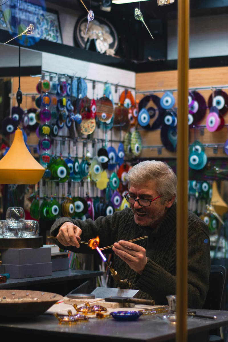 man working in his workshop evil eye