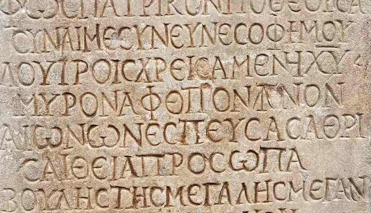 Greek funerary inscription with scriptio continua