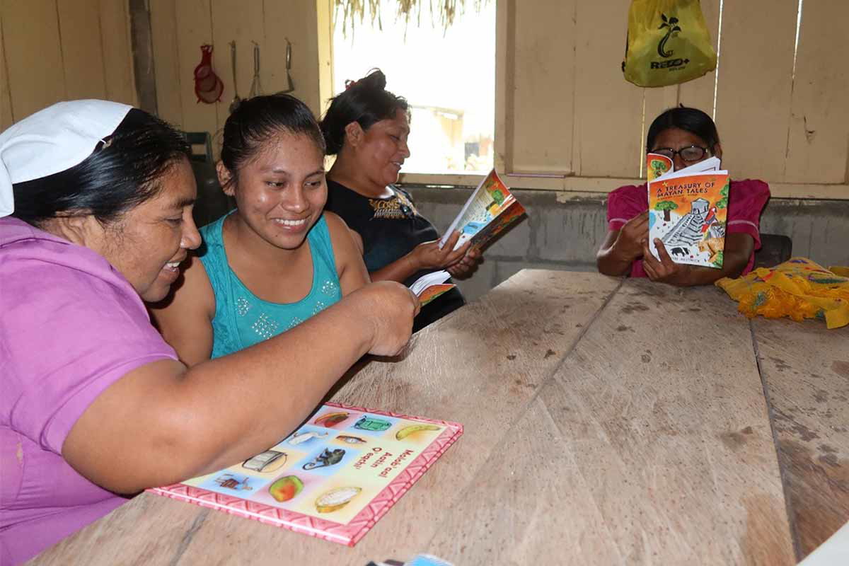 womens group receiving copies books