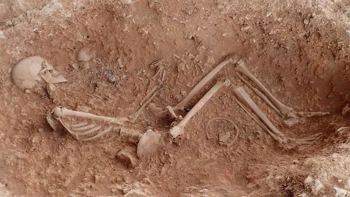 anglo saxon burial woman cradling baby