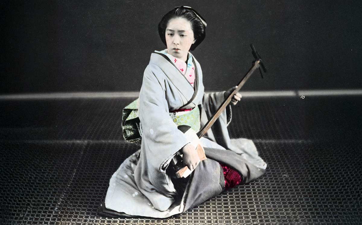 geisha with shamisen japanese instruments