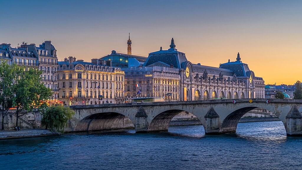Exterior of the Musée d’Orsay building along the Seine River.