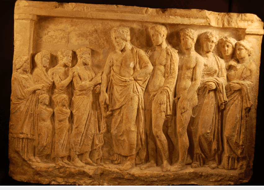 Asclepius with his sons Podalirius and Machaon and his three daughters, with supplicants, Greek relief, c. 470-450 BCE. Source: National Archaeological Museum of Athens