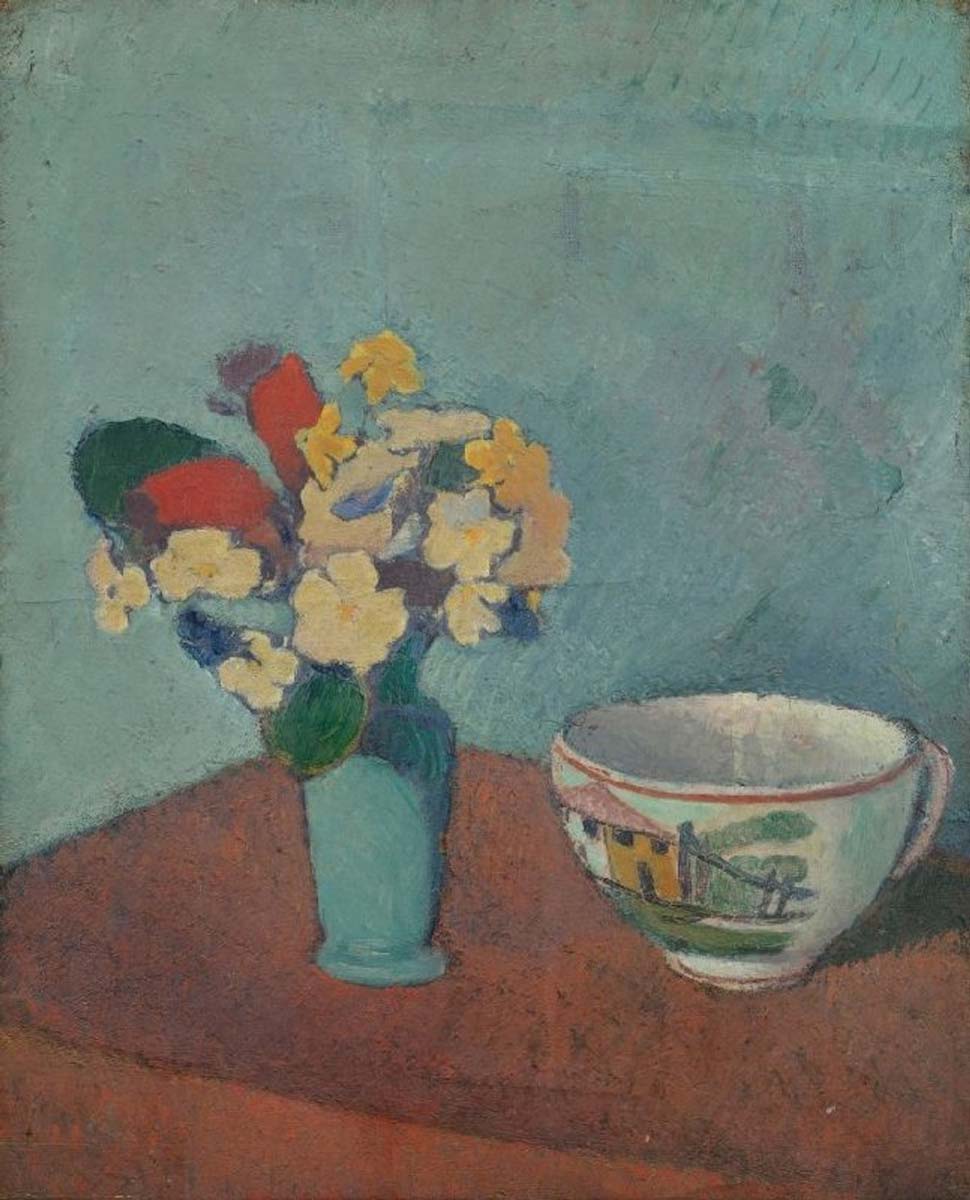 bernard vase with flowers and cup