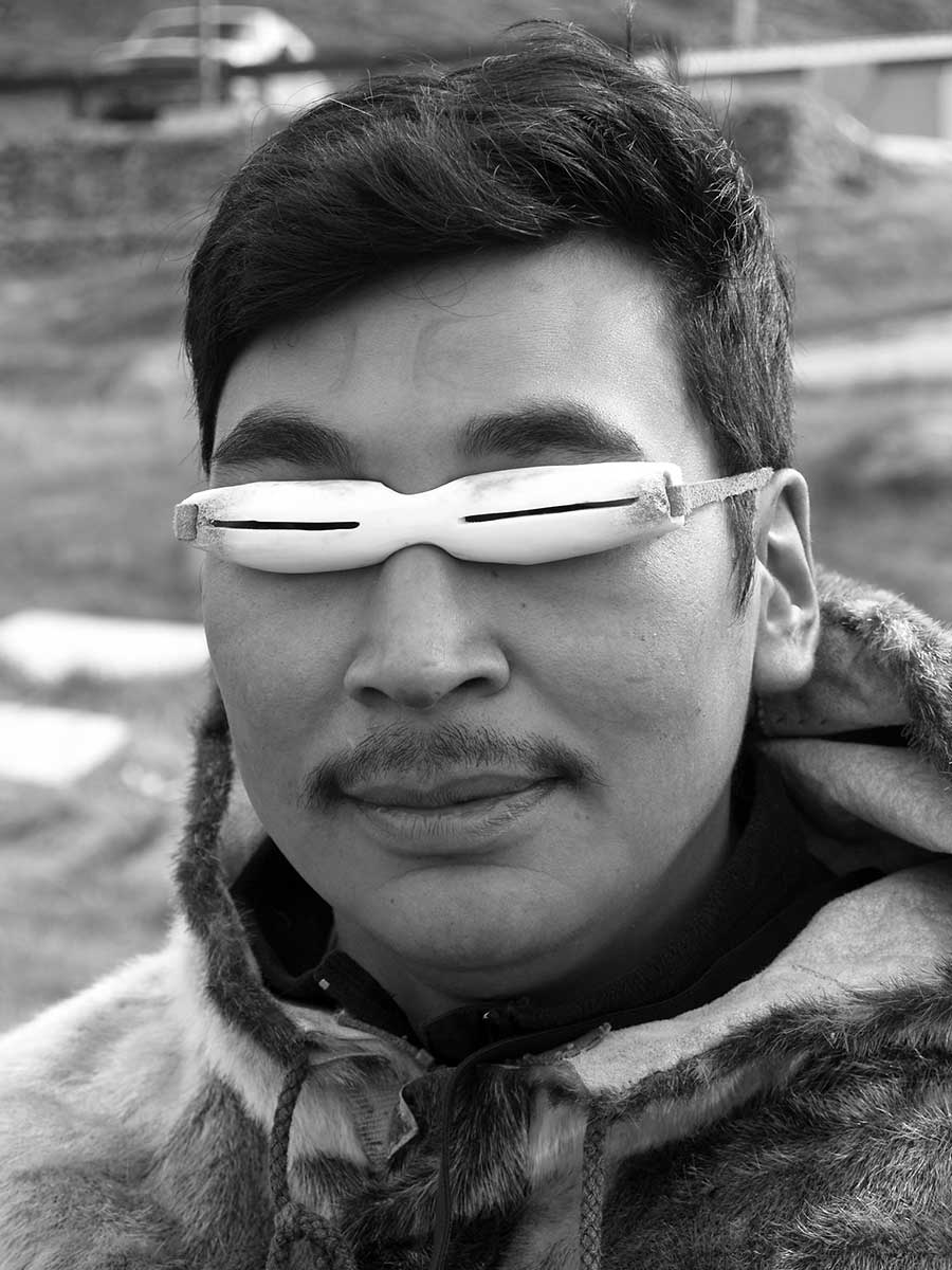 inuit man caribou snow goggles
