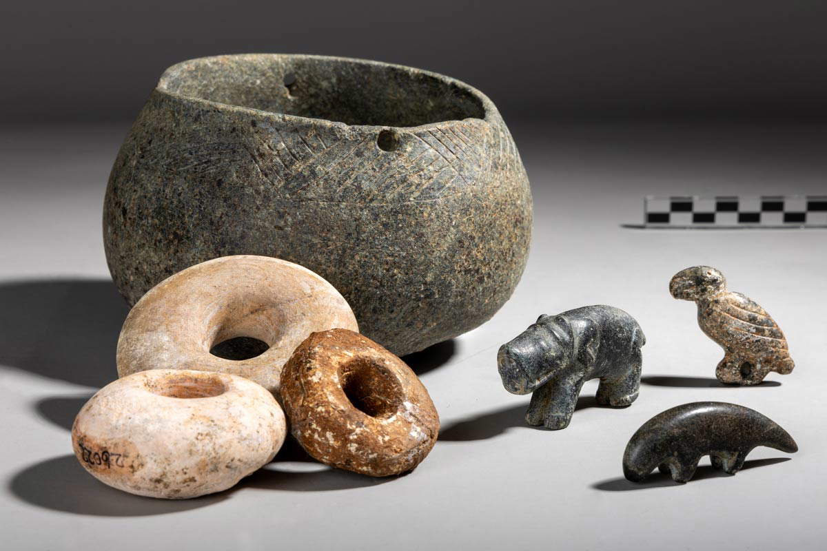 photo of figurines from Karahantepe inside a vessel