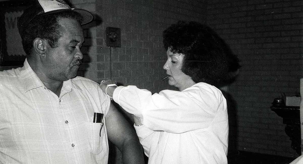 man getting vaccinated for immunization