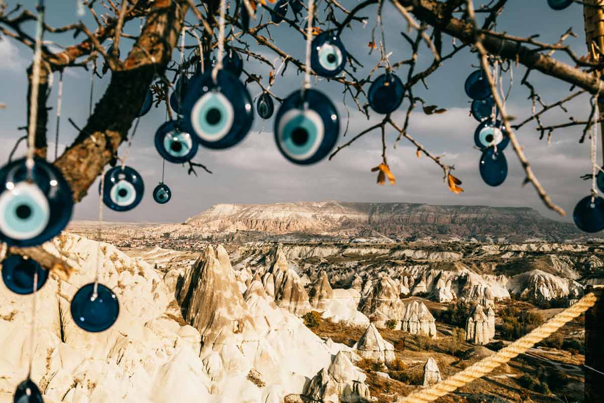 nazar amulets tree branches in cappadocia