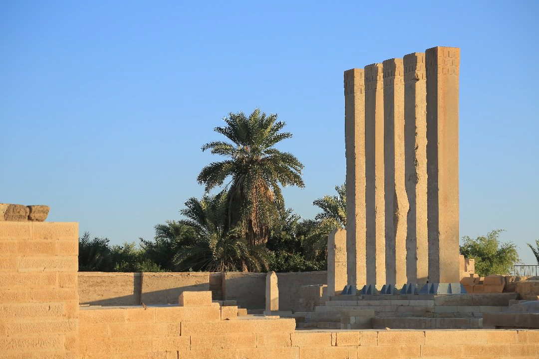 Wide color photo of the Bar'an Temple ruins at Ma’rib with ringed columns and paving, early 1st millennium BCE, Sabaean sanctuary.