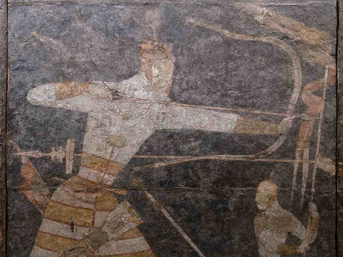 Color mural fragment from Panjikent depicting armored figures and attendants, reflecting Sogdian culture along the Silk Road.