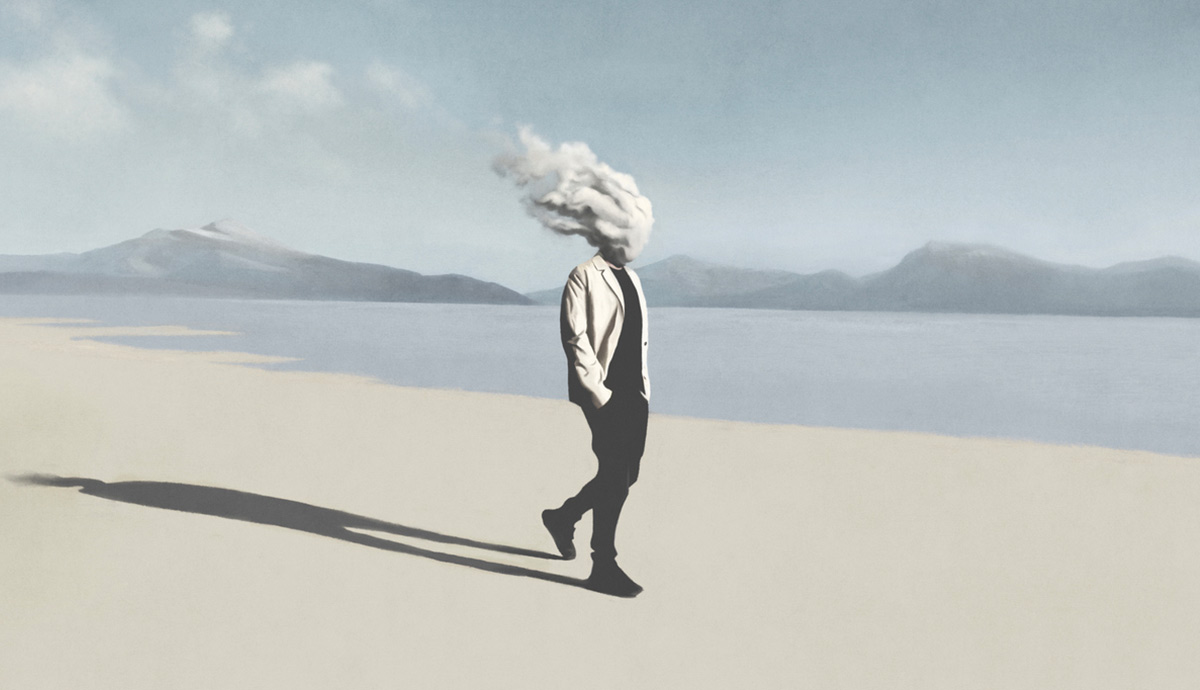 Man walking with cloud head on beach