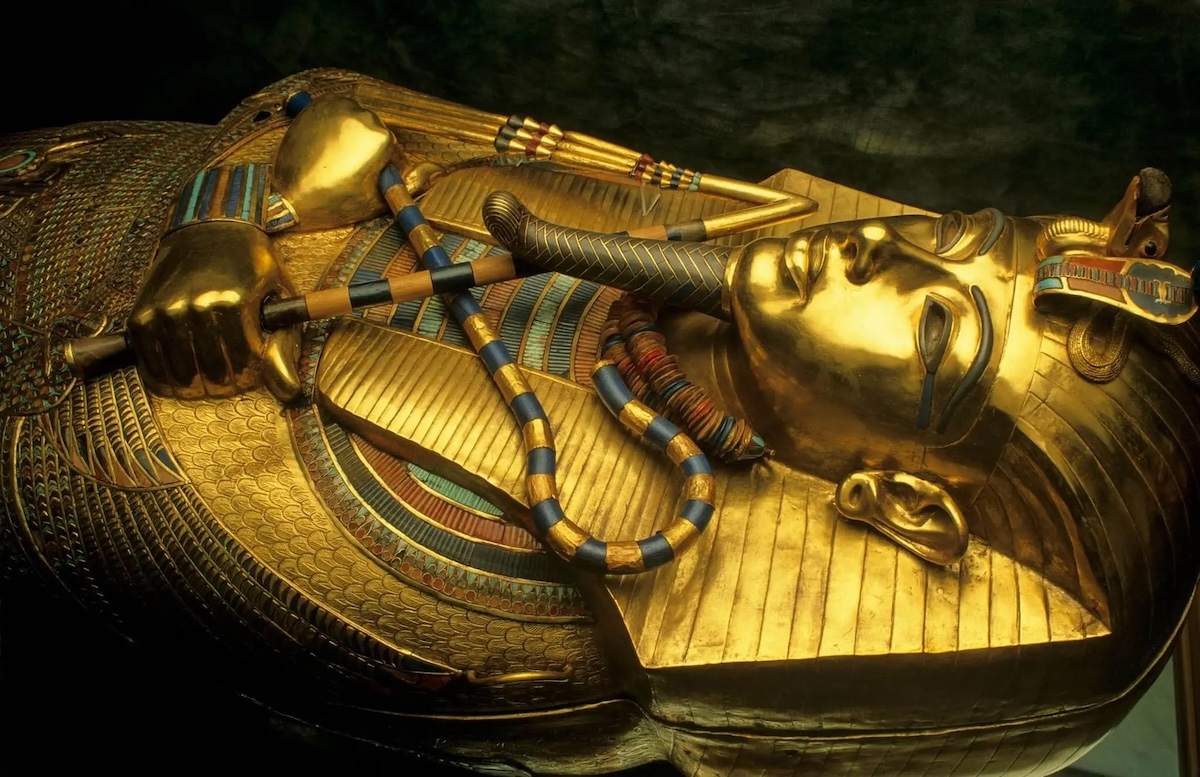 Inner gold coffin of Tutankhamun with crossed crook and flail
