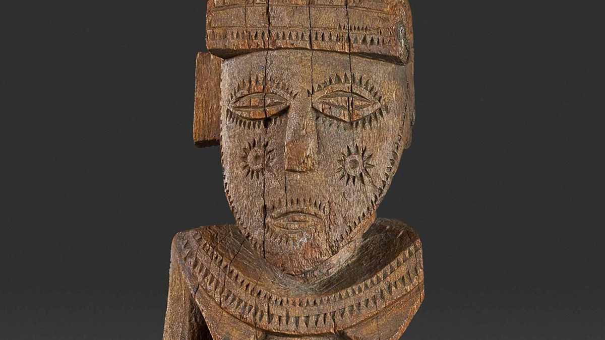 islanders wooden figure pidgin languages