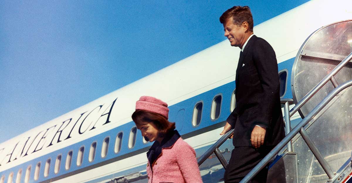 pink suit airplane