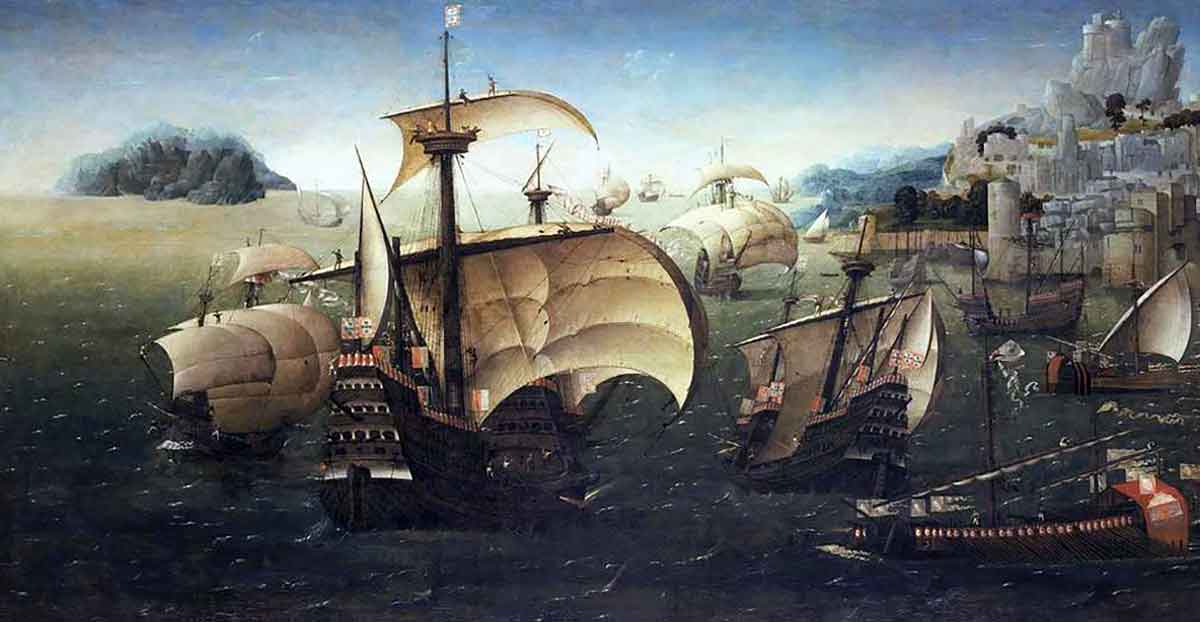 portuguese carracks off a rocky coast