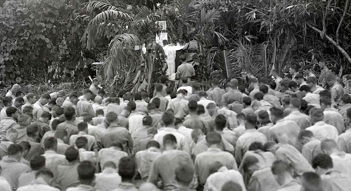 christmas mass soldiers kneeling south pacific