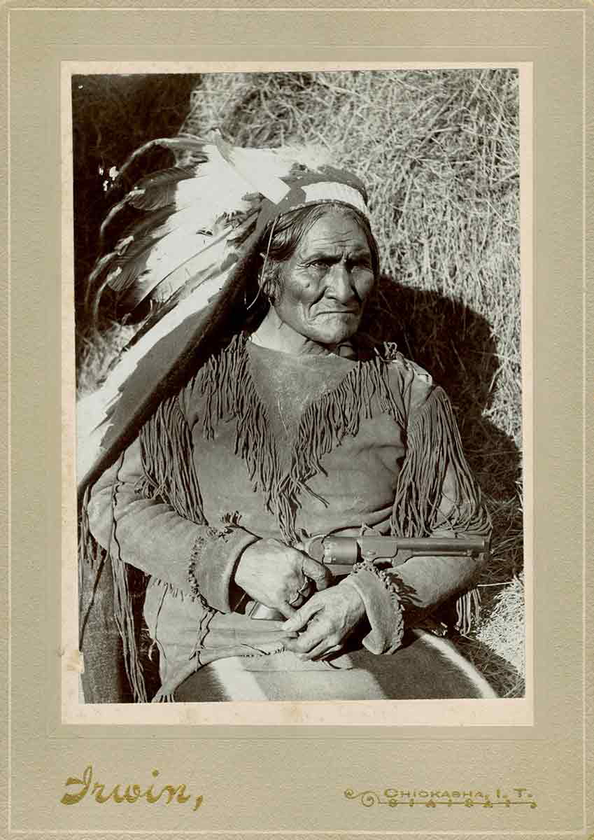 geronimo in headdress w pistol