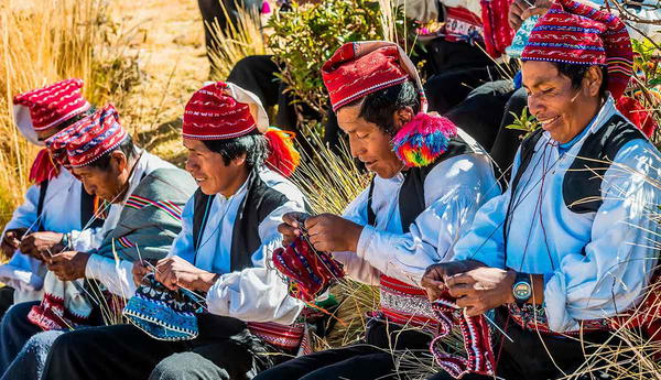 taquile island men knitting