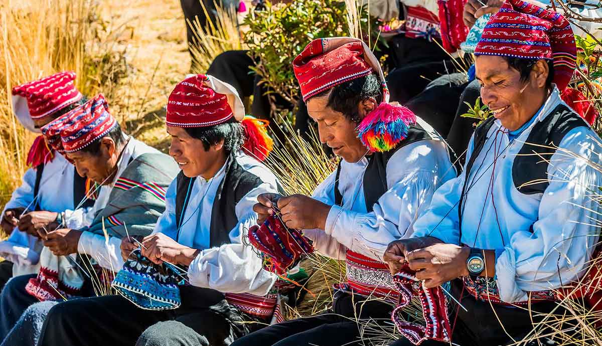taquile island men knitting