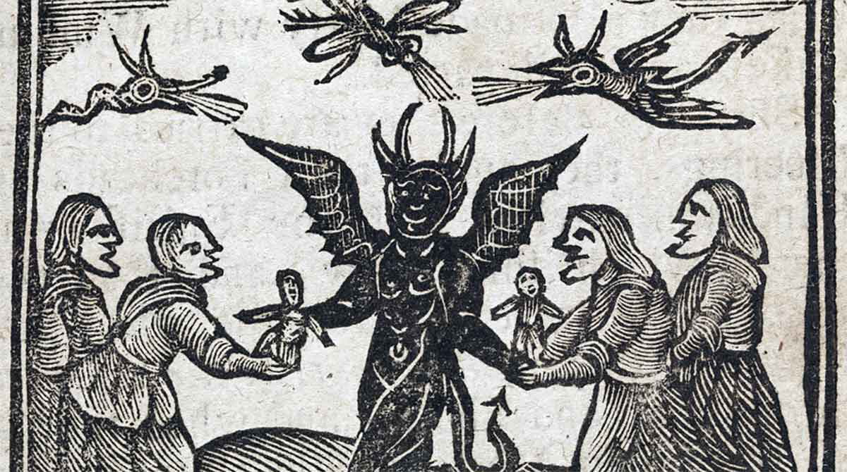 Devil giving witches wax figures